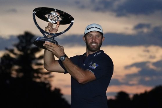 Dustin Johnson with the Northern Trust trophy two weeks ago.