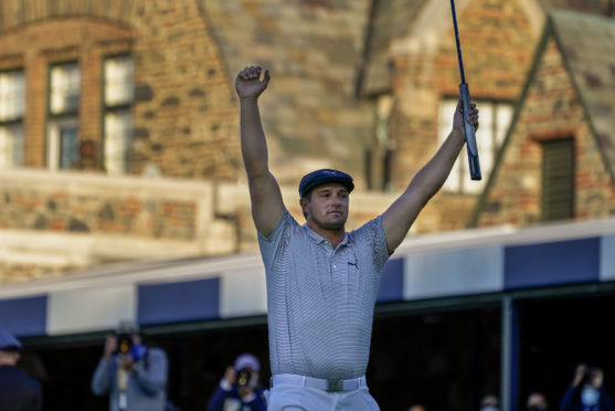 Bryson DeChambeau, of the United States, reacts after sinking a putt for par on the 18th hole to win the US Open Golf Championship.
