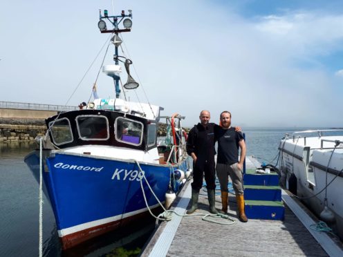 James Cameron and Alberto Morales Utrera with their boat Concord at Kyleakin, Syke.