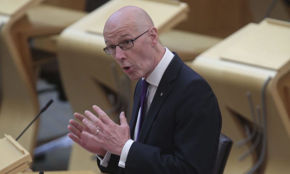 John Swinney was challenged over Aberdeen schools' safety.