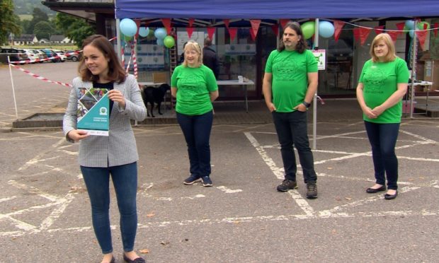 Kate Forbes and members of the Loch Ness Hub at share offer launch.