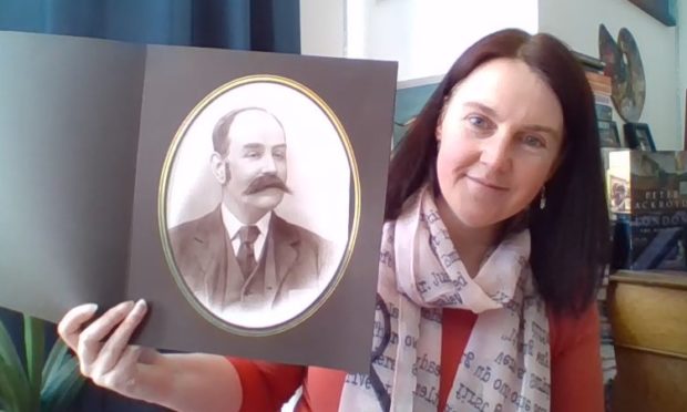 Lorna Steele with a picture of her great great grandfather William Edwards