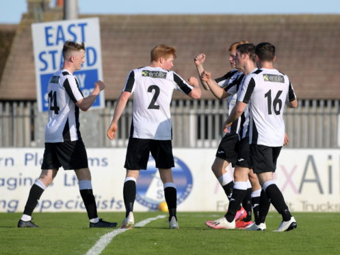Ryan Sargent celebrates his goal with team-mates. 
Picture by Kath Flannery