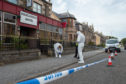 Forensic officers at the scene in Buckie