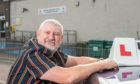 Driving instructor Bill Addison outside Buckie swimming pool.