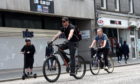 Cyclists on Union Street, Aberdeen.