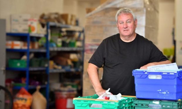 CFine development work manager Dave Kilgour has concerns potential redundancies in the north-east will mean thousands more will have to turn to the charity for help.    
Picture by Kami Thomson.