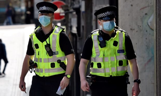 Police in Belmont Street, Aberdeen. Picture by Scott Baxter.