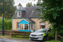 Police outside the house on Kingussie Road in Newtonmore