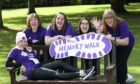 Walkers celebrate taking part in the Alzheimer Scotland Memory Walk in Hazlehead Park, Aberdeen.

Picture Simon Price/Firstpix