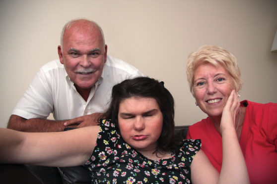 Roy Cox with wife Liz and daughter Cheryl.