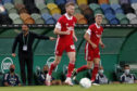 Derek McInnes, left, gestures during the Europa League third qualifying round game between Sporting CP and Aberdeen.