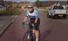 Buckie woman Stephanie Cormack  cycles 100 miles to raise more than £1,700 for charity that supports her husband who suffers from MS.