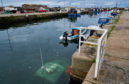 Lobster type fishing boat sank overnight within Burghead Harbour.