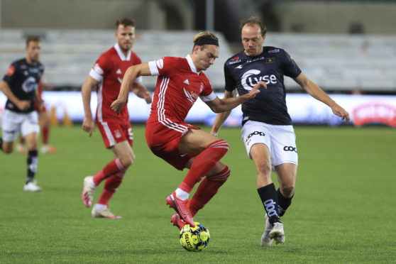 Aberdeen's Ryan Hedges and Viljar Vevatne of Viking compete for the ball