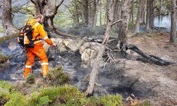 The fire on Eilean Eachainn, one of the Loch Maree Islands.