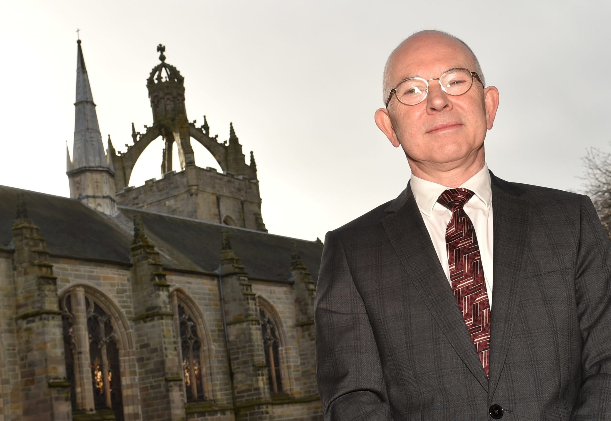 Principal of Aberdeen University Professor George Boyne in front of the university.
