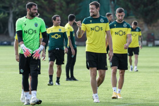 Sporting CP goalkeeper Antonio Adan (L) talks with club captain Sebastian Coates after training in the build up to tonight's Aberdeen clash.