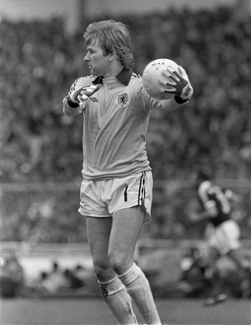 Alan Rough holds the ball while playing for Scotland