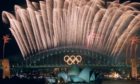 The closing ceremony fireworks for the 2000 Olympic Games erupt over the Sydney Harbour Bridge.