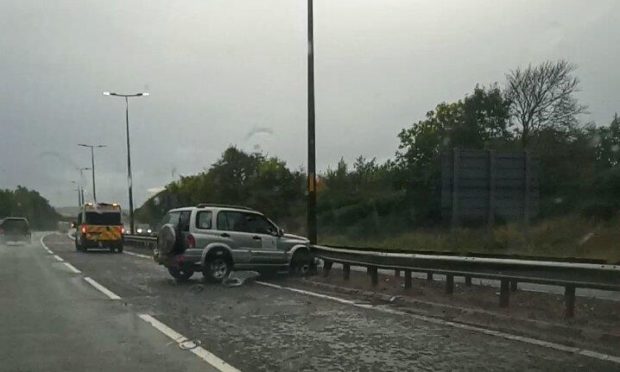 The vehicle came to a rest next to the central reservation