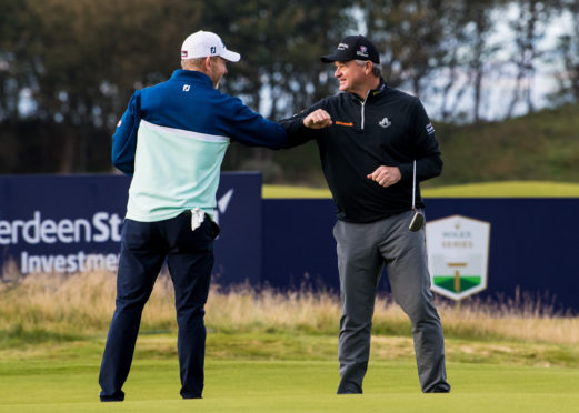 Congratulating Paul after his final European Tour hole.