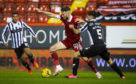 Aberdeen's Marley Watkins and Conor McCarthy in action