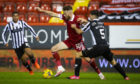 Aberdeen's Marley Watkins and Conor McCarthy in action