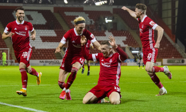 Lewis Ferguson celebrates after scoring to make it 2-1 to Aberdeen against St Mirren.