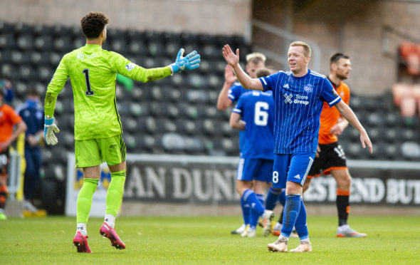 Peterhead's Scott Brown celebrates with Josh Rae against Dundee.