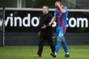 Inverness manager John Robertson speaks with Robbie Deas at full-time.