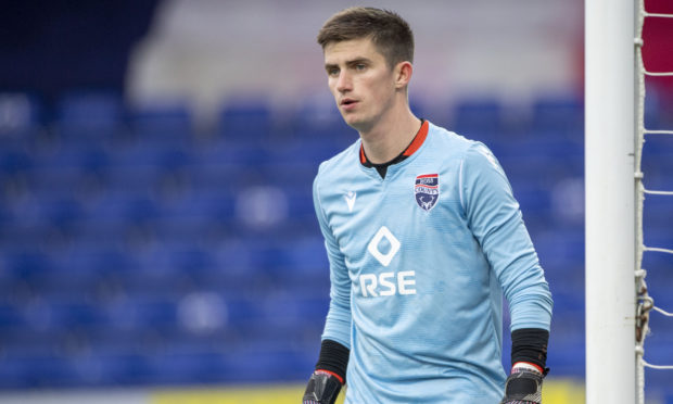 Ross Doohan in action for Ross County.