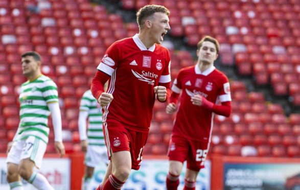 Aberdeen's Lewis Ferguson celebrates after scoring against Celtic. Brown will likely help the midfielder develop further.