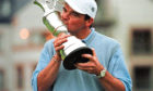 Paul Lawrie with the Claret Jug in 1999.