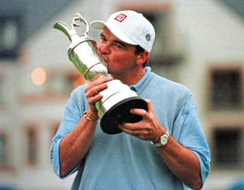 Paul Lawrie with the Claret Jug in 1999.