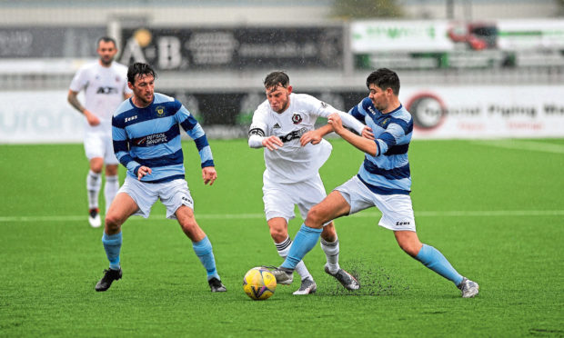 Dee, pictured in pre-season action against Cove Rangers, have a Scottish Cup tie against Fraserburgh this weekend.