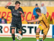 Cameron Harper, left, playing for Caley Thistle.