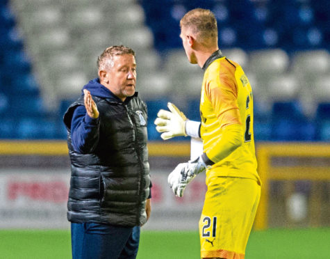 John Robertson with goalkeeper Cammy Mackay at the end of the Cowdenbeath game.