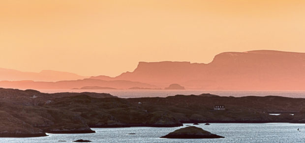 View over Scalpay and Isle of Skye looking out from Isle of Harris in the Outer Hebrides.