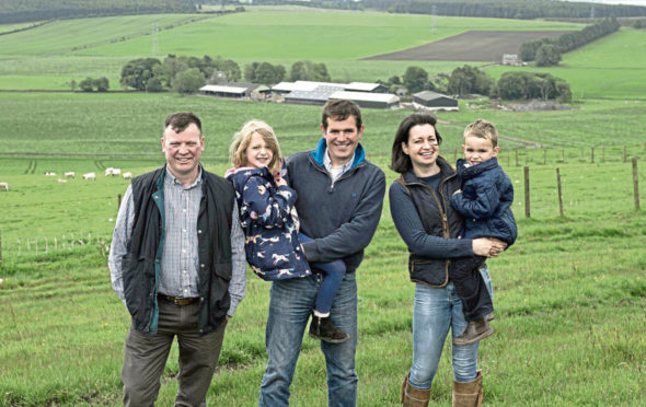 ScotSheep chairman Willy Millar, left, with host farmers Robert and Hazel McNee and children Kate and Alan.