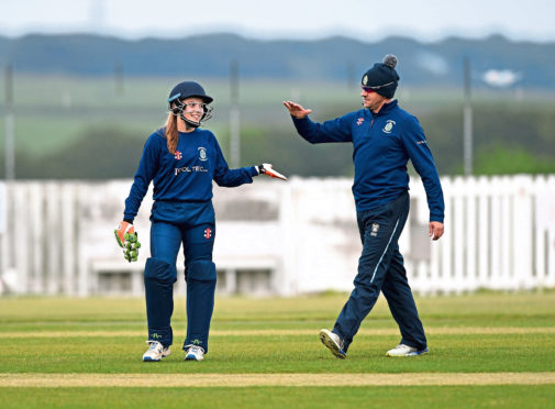 Ailsa Lister, left, of Stoneywood-Dyce celebrating after taking a wicket.
Picture by Scott Baxter