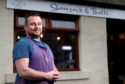 Pictured is Shamrock and Thistle owner Gerard Browne outside his cafe in Stonehaven.
Picture by Scott Baxter.