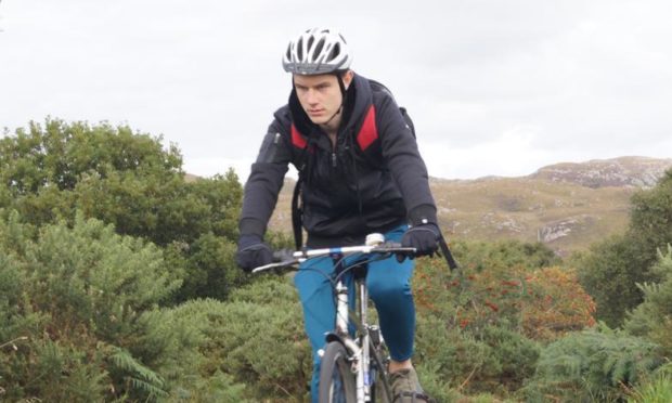 Eòsaph Caimbeul, 17, taking part in a charity cycle ride from Edinburgh to Skye.