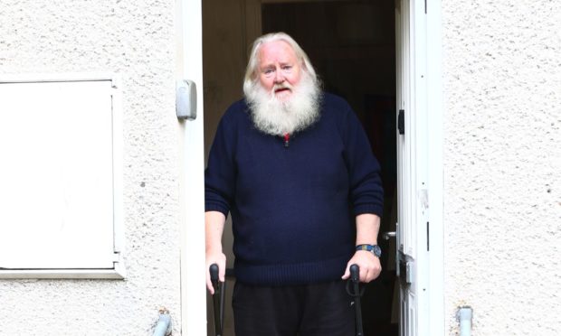 Angus MacPhee outside his house in Oban.