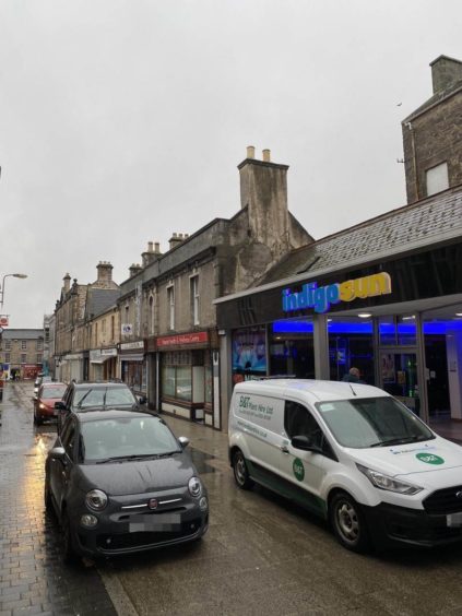 Cars parked illegally in Elgin town centre