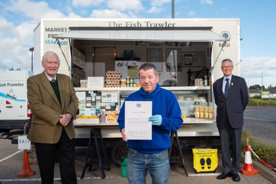 Lord-Lieutenant of Banffshire Andrew Simpson (right), with Ian McCallion and Seymour Monro, Lord-Lieutenant of Moray.
Picture by Jason Hedges.