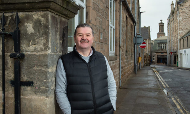 Elgin Baptist Church pastor Graham Swanson outside the old Moray Council building.