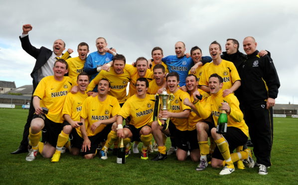 Nairn County's victorious 2011 Highland League Cup squad, with Gregg Main (bottom right)