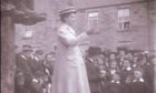A suffragette, believed to be Adela Pankhurst - daughter of Emmeline - at an open-air meeting in Perth in 1908.