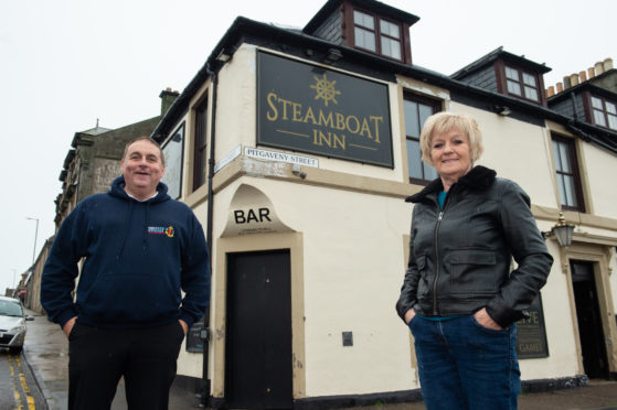 4th Lossiemouth Company Boys' Brigade captain James Allan and Steamboat Inn owner Hazel Istance at the Steamboat Inn pub - who has given the group temporary facilities for free. 
Picture by Jason Hedges.